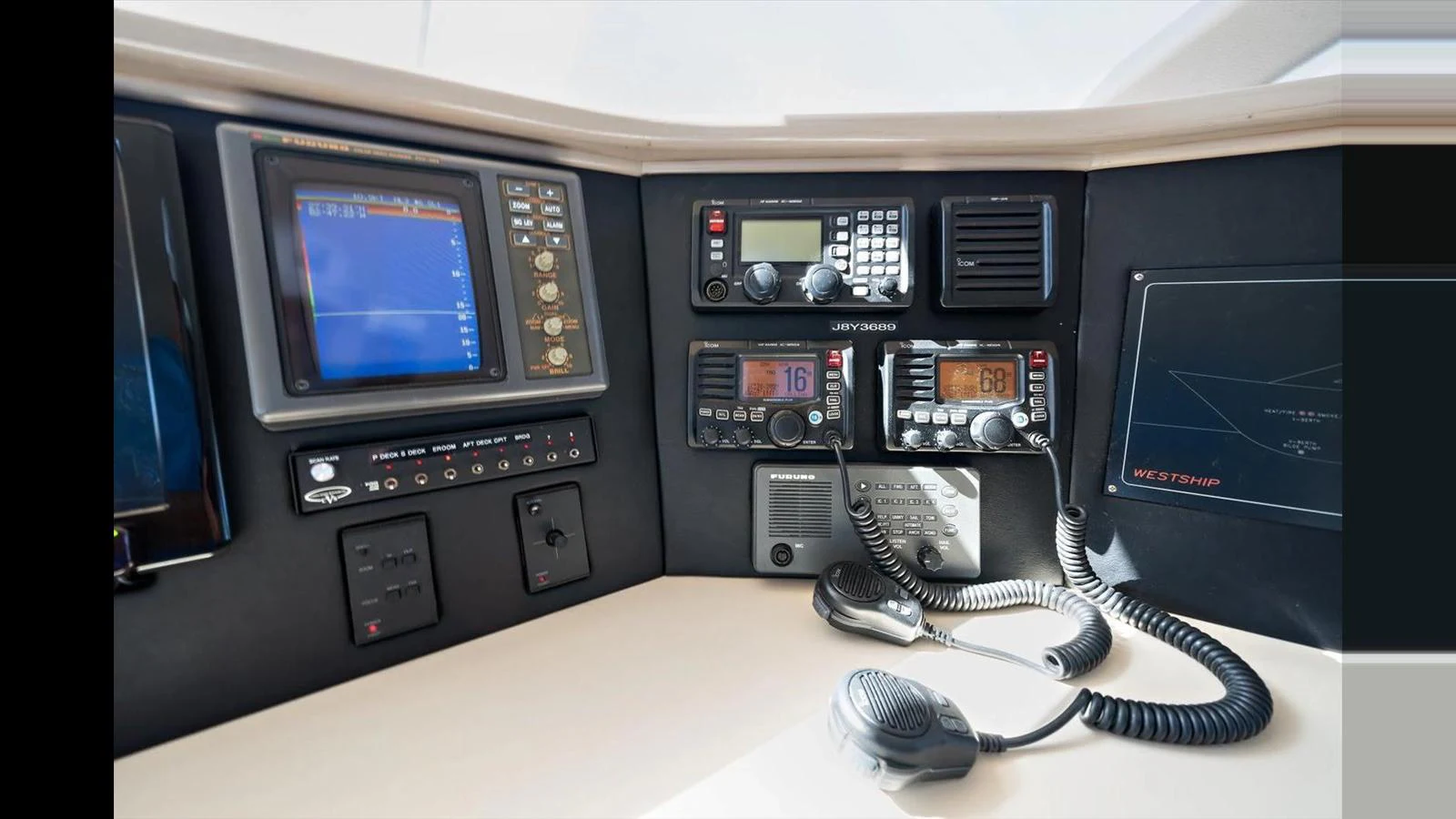 The helm features advanced navigation and communication equipment for a safe and efficient voyage. aboard THINK B.I.G Yacht for Sale