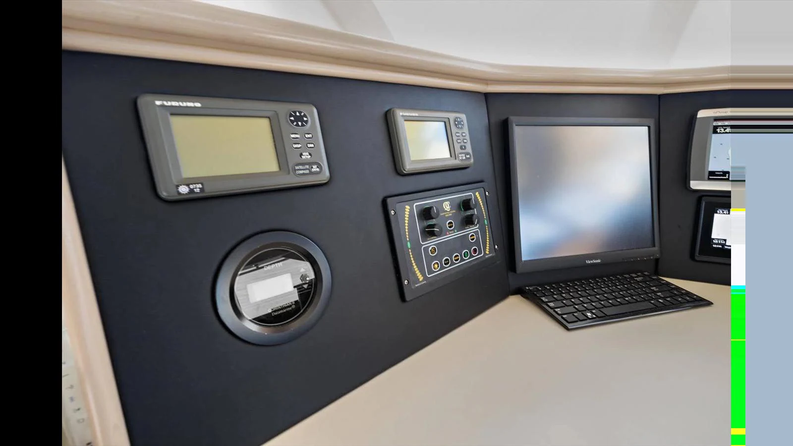 The helm features advanced navigation and communication equipment for a seamless sailing experience. aboard THINK B.I.G Yacht for Sale