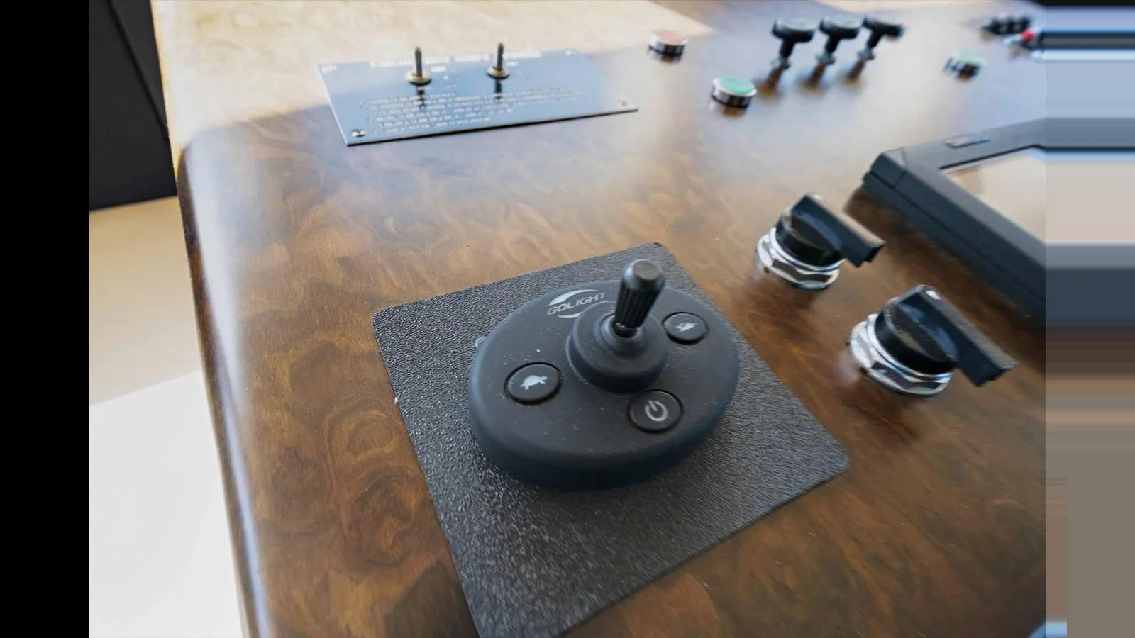 A close-up view of the yacht's helm control panel showcasing its sophisticated controls. aboard THINK B.I.G Yacht for Sale