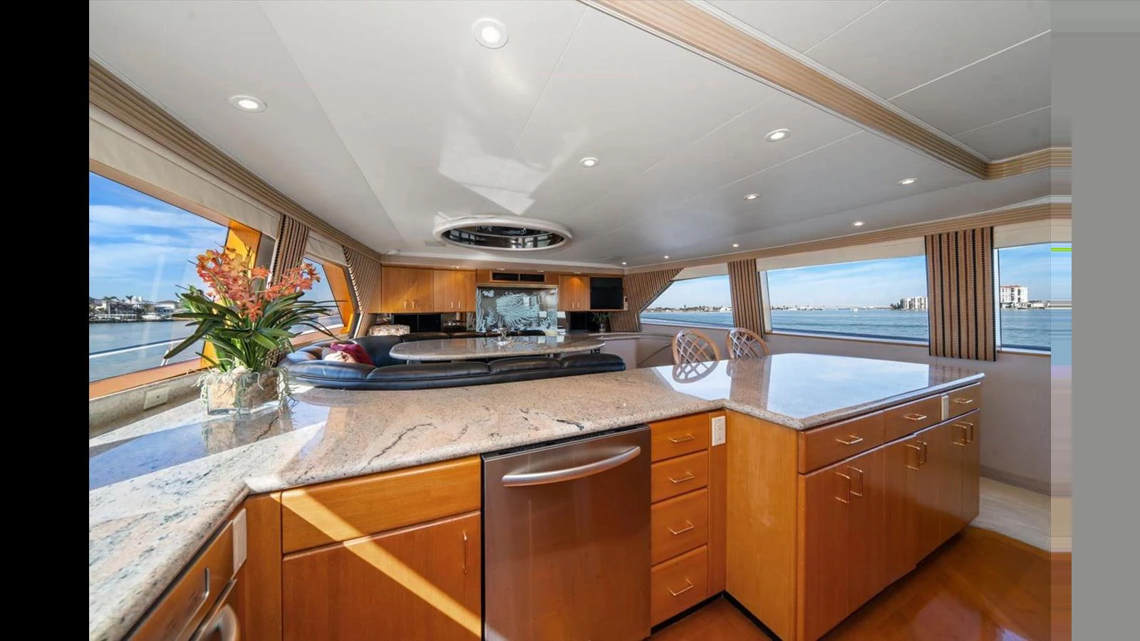 The yacht's galley features modern appliances and ample counter space with panoramic views. aboard THINK B.I.G Yacht for Sale