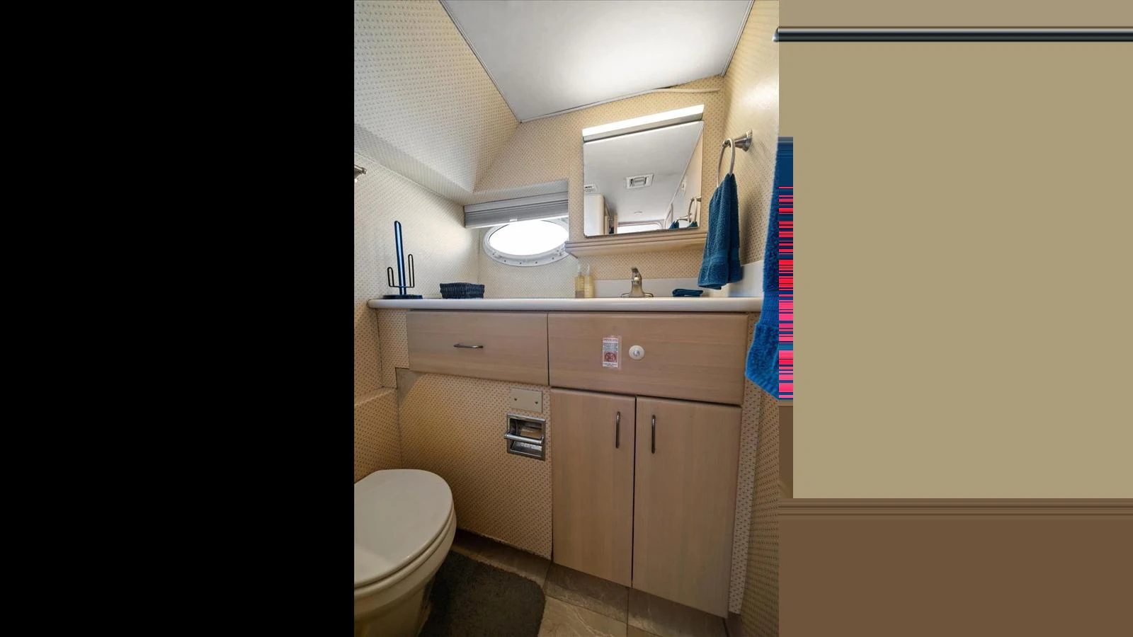 The yacht's bathroom features modern fixtures and a clean, functional design. aboard THINK B.I.G Yacht for Sale