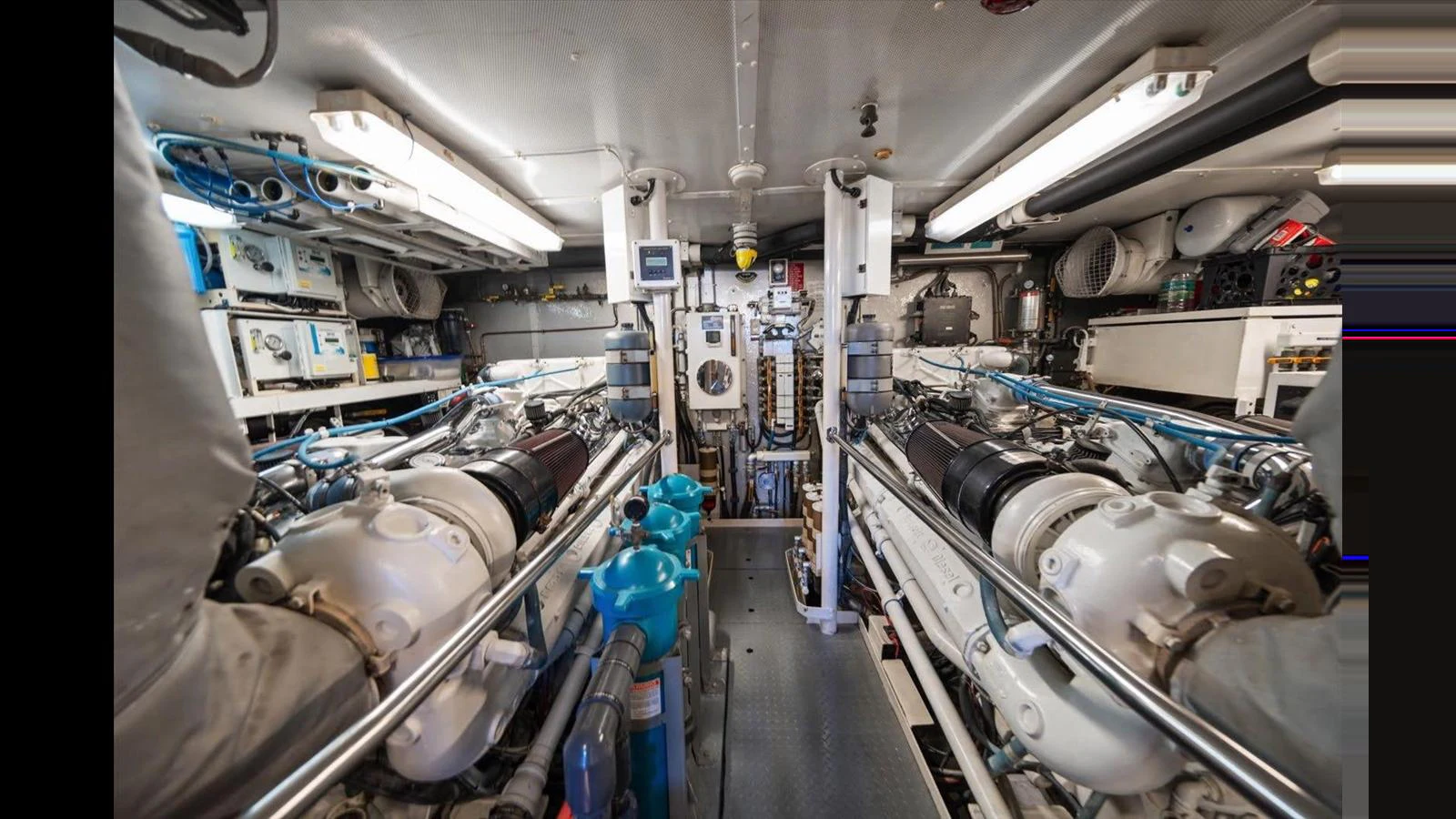 The engine room is meticulously organized, showcasing advanced machinery and systems. aboard THINK B.I.G Yacht for Sale