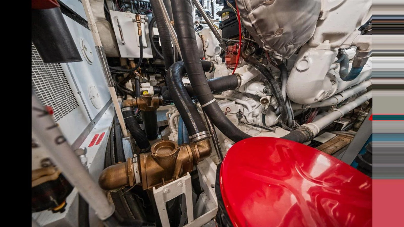 The image showcases the intricate details of the yacht's engine room, highlighting its mechanical components. aboard THINK B.I.G Yacht for Sale