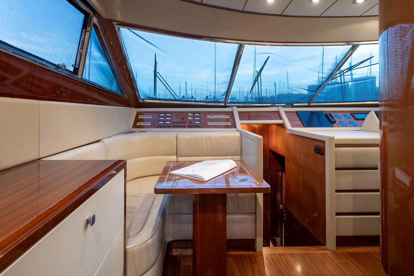 a room with a couch and a table aboard AXEBT Yacht for Sale