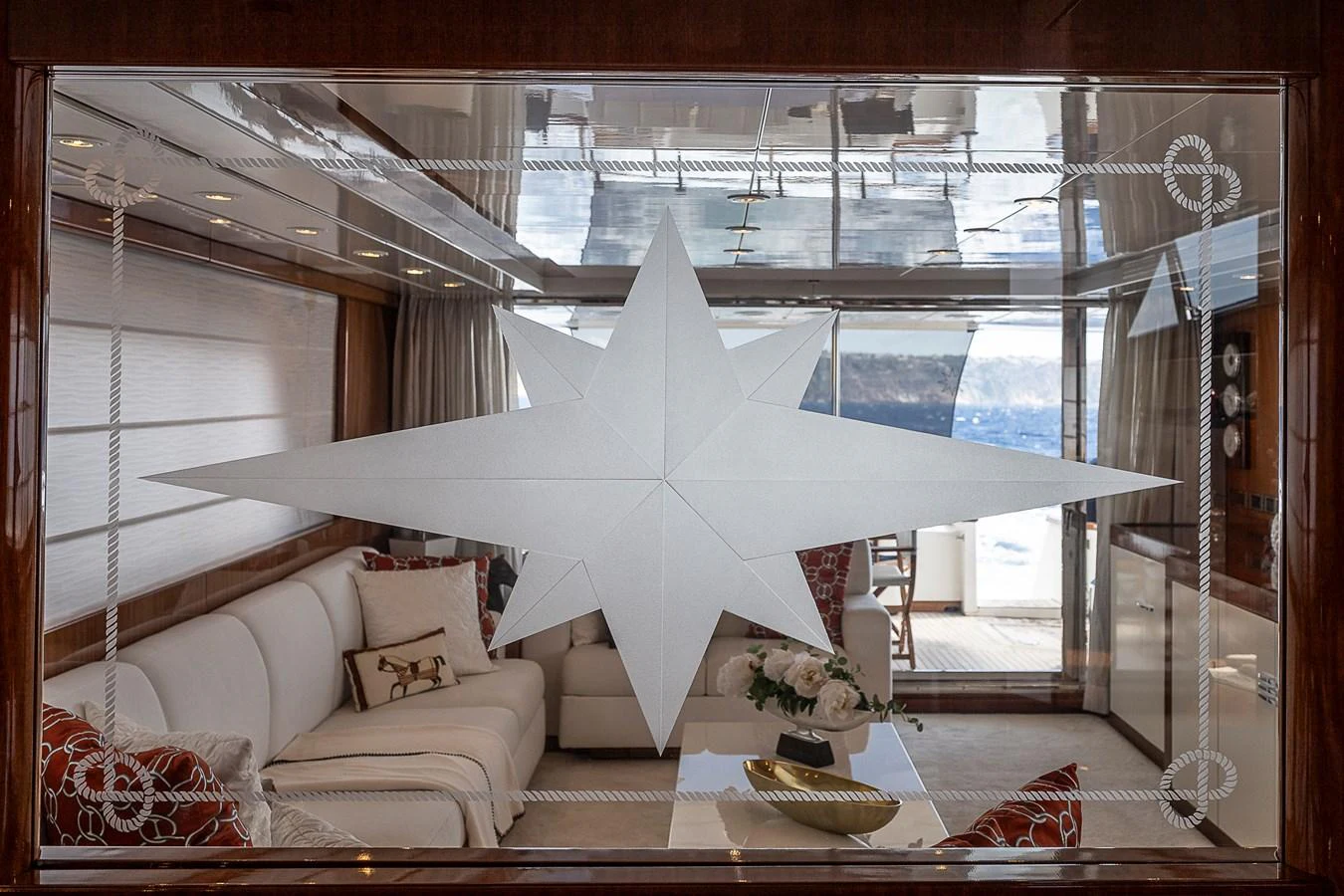 a room with a couch and a large white tent aboard AXEBT Yacht for Sale