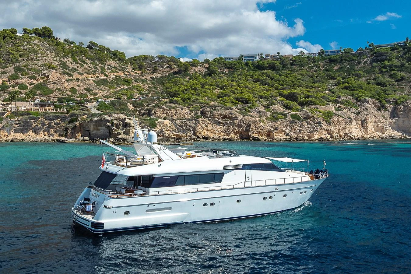 a white yacht in the water aboard AXEBT Yacht for Sale