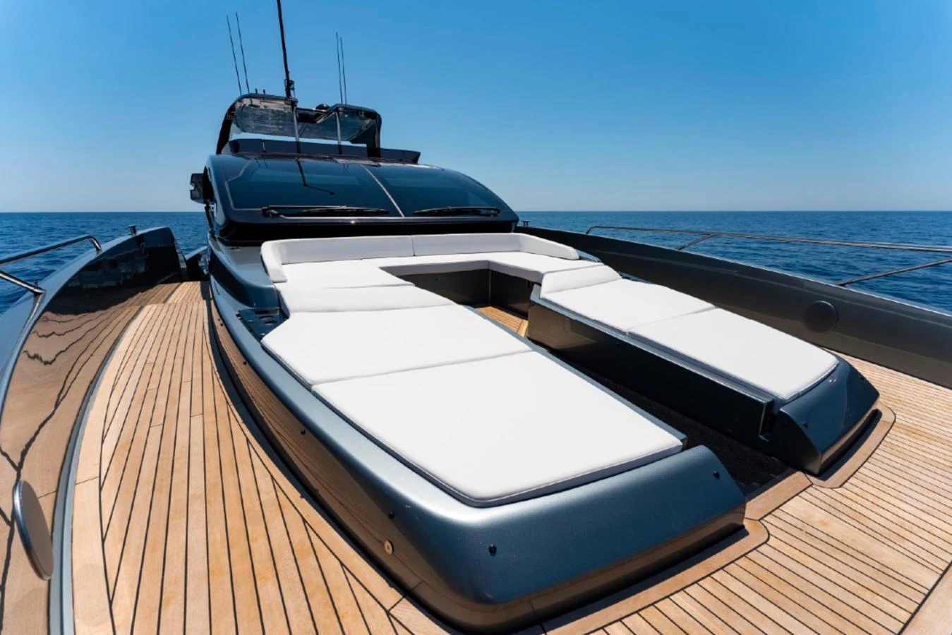 The yacht's foredeck features luxurious sun pads for ultimate relaxation. aboard COCO Y Yacht for Sale