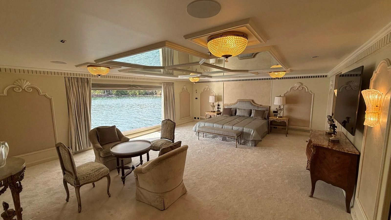 The master stateroom offers a spacious and elegant retreat with a stunning view of the water. aboard LADY SARYA Yacht for Sale