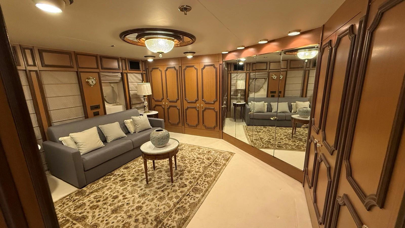 The salon features elegant wood paneling, plush seating, and a luxurious ambiance. aboard LADY SARYA Yacht for Sale