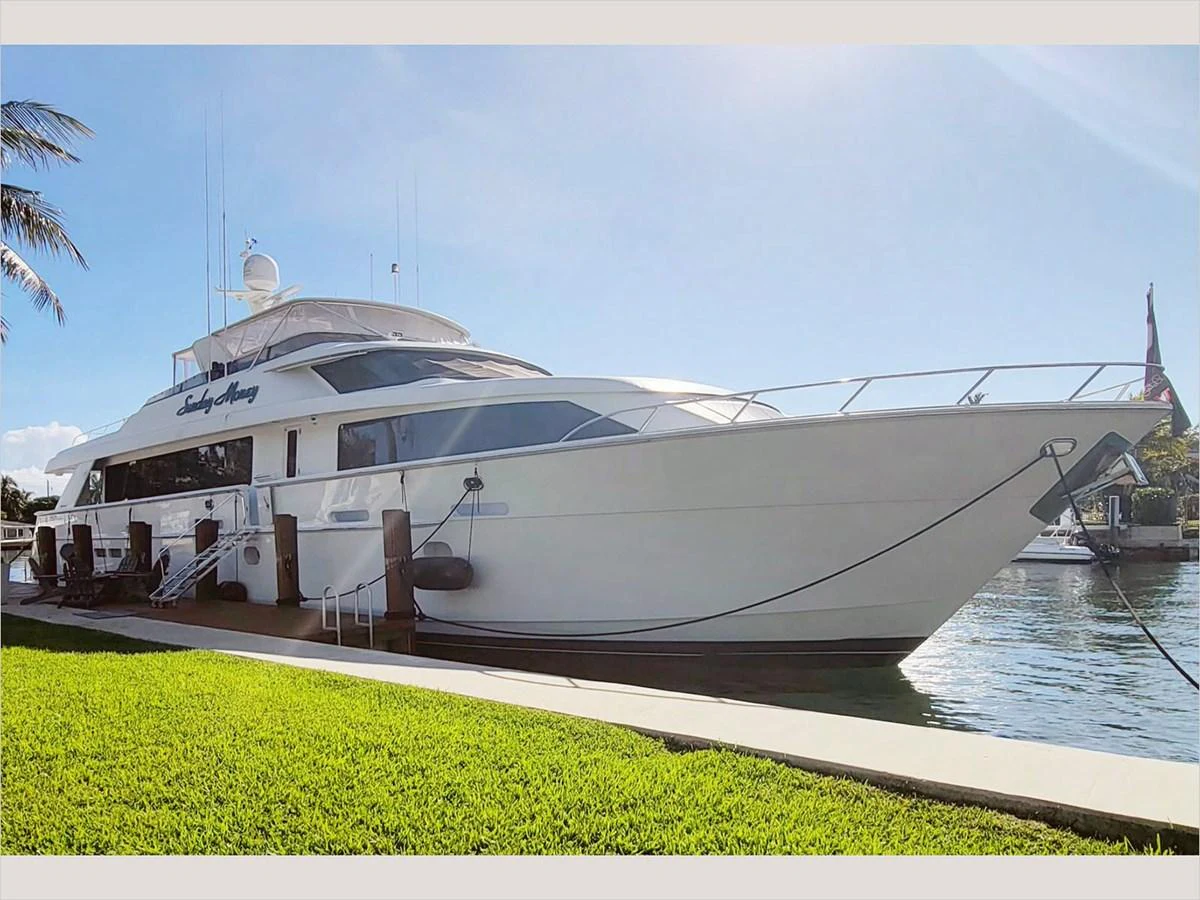 a large white yacht aboard 100' HATTERAS 2001 CUSTOM YACHT Yacht for Sale