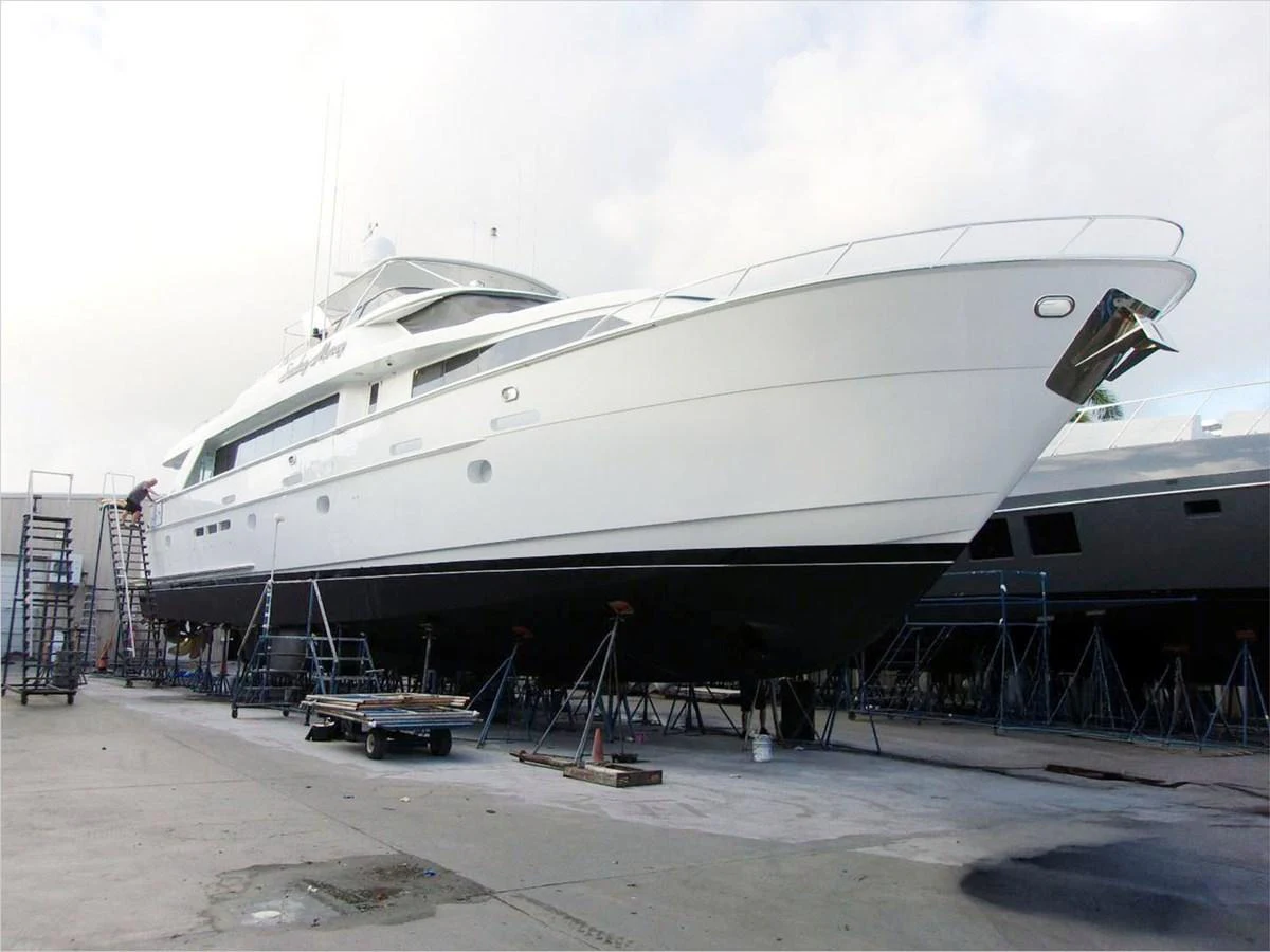 a large white boat aboard 100' HATTERAS 2001 CUSTOM YACHT Yacht for Sale