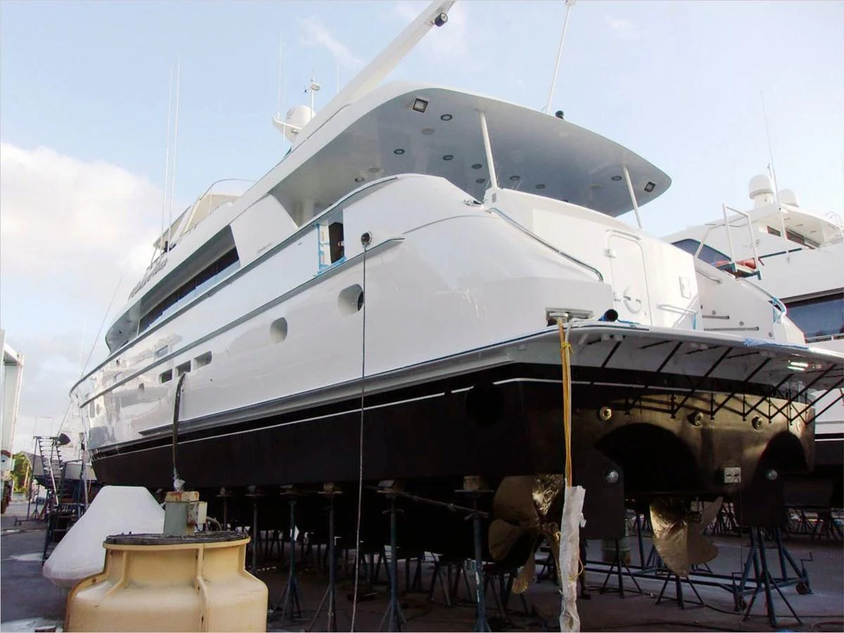a large white yacht aboard 100' HATTERAS 2001 CUSTOM YACHT Yacht for Sale