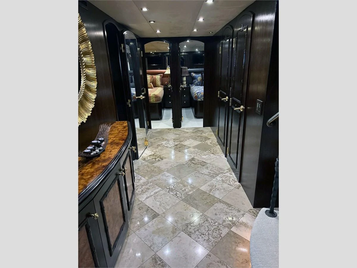 a kitchen with a marble floor aboard 100' HATTERAS 2001 CUSTOM YACHT Yacht for Sale