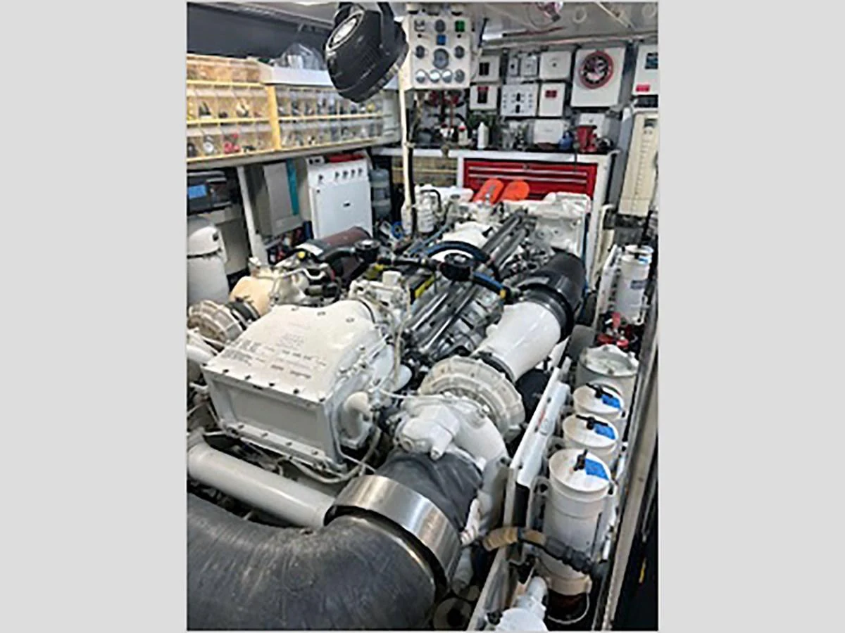 a car in a garage aboard 100' HATTERAS 2001 CUSTOM YACHT Yacht for Sale