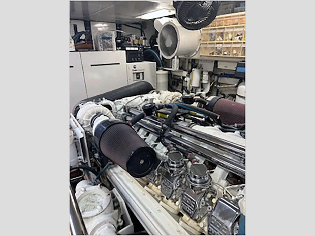 a machine with a large metal object aboard 100' HATTERAS 2001 CUSTOM YACHT Yacht for Sale