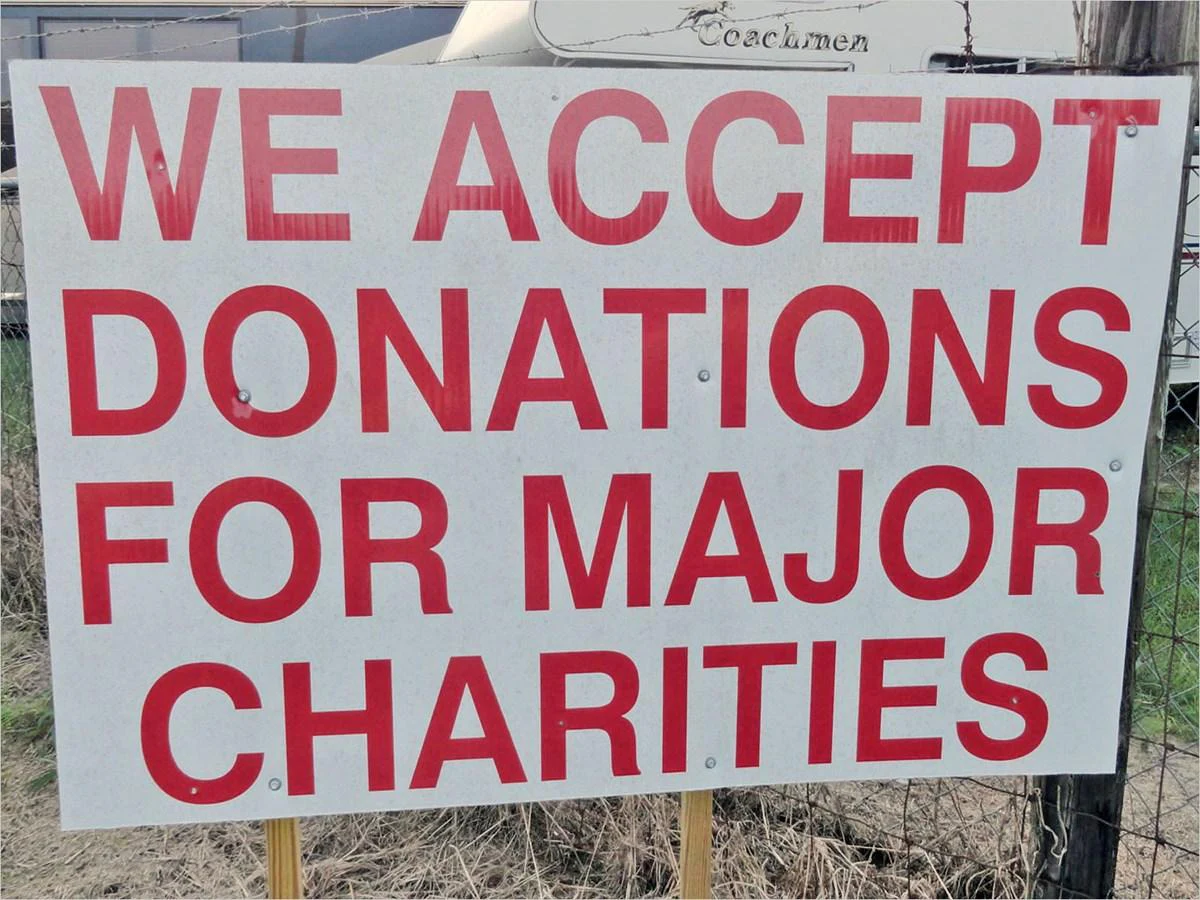a sign with red text aboard 100' HATTERAS 2001 CUSTOM YACHT Yacht for Sale