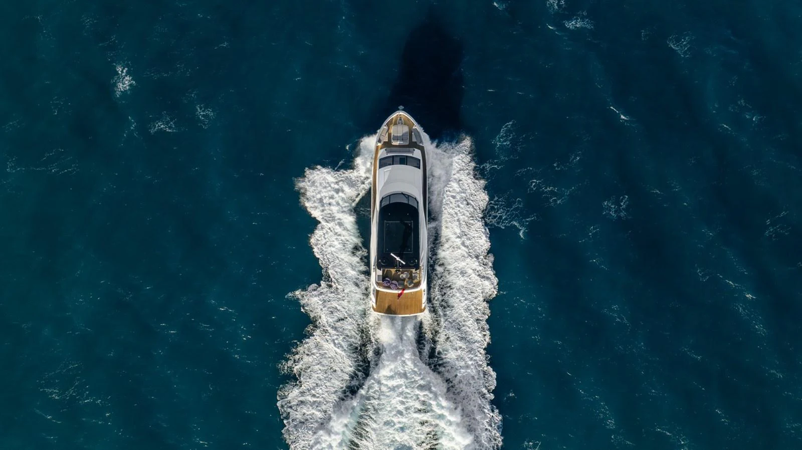 a white and black boat in the water aboard AURELIUS Yacht for Sale