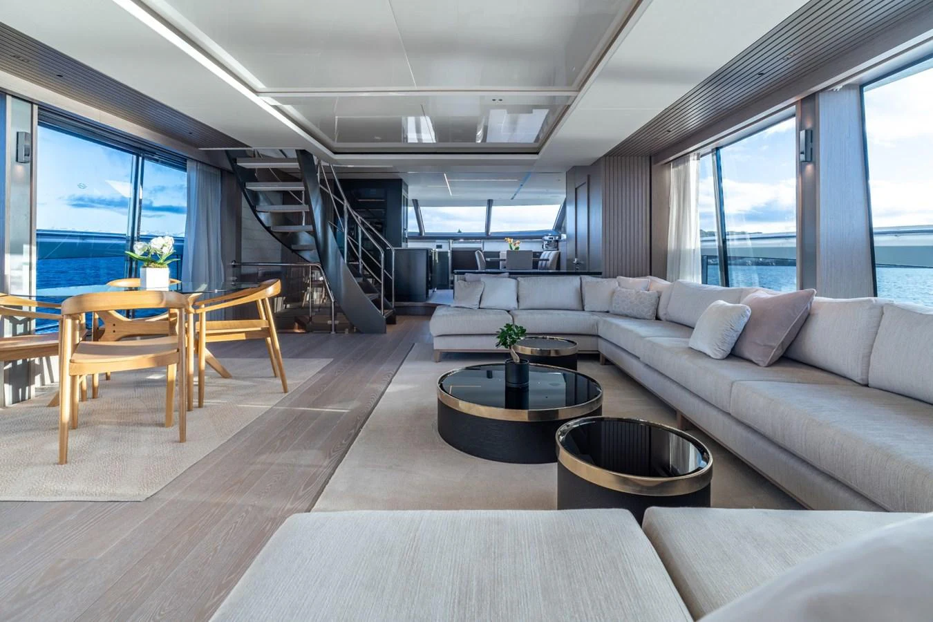 a living room with a large window aboard AURELIUS Yacht for Sale