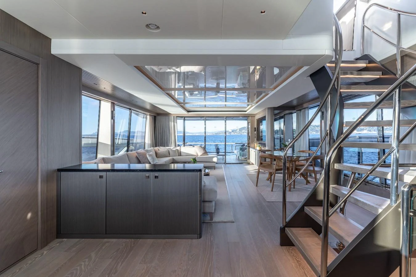 a room with a couch and a table aboard AURELIUS Yacht for Sale