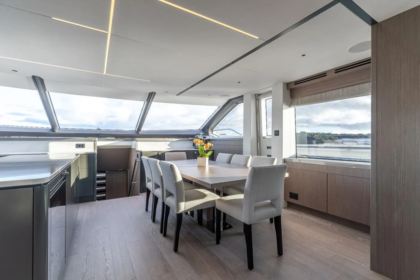 a room with a table and chairs aboard AURELIUS Yacht for Sale