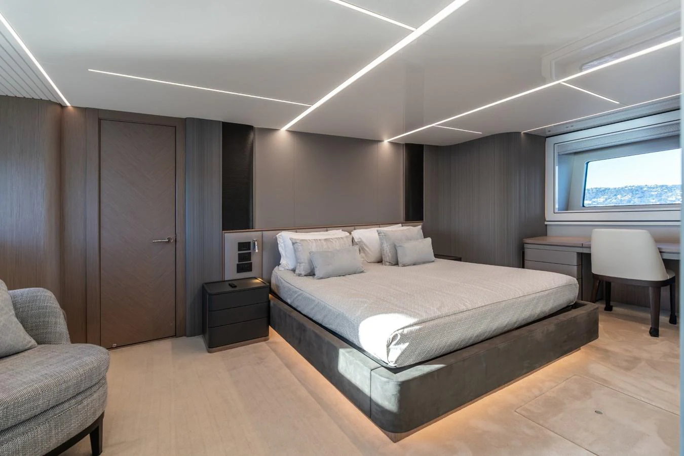a large bedroom with a bed aboard AURELIUS Yacht for Sale