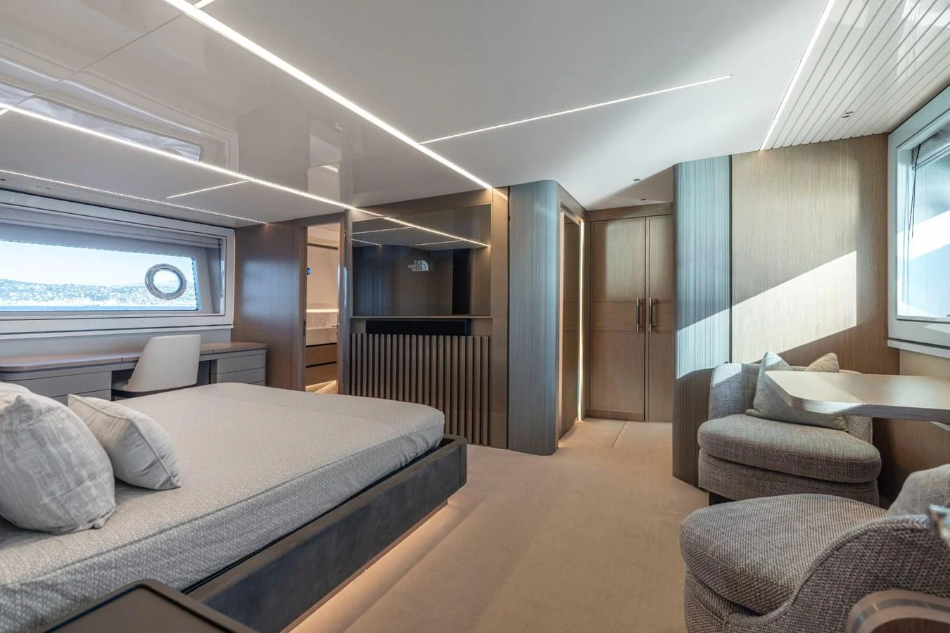 a room with a bed and a couch aboard AURELIUS Yacht for Sale