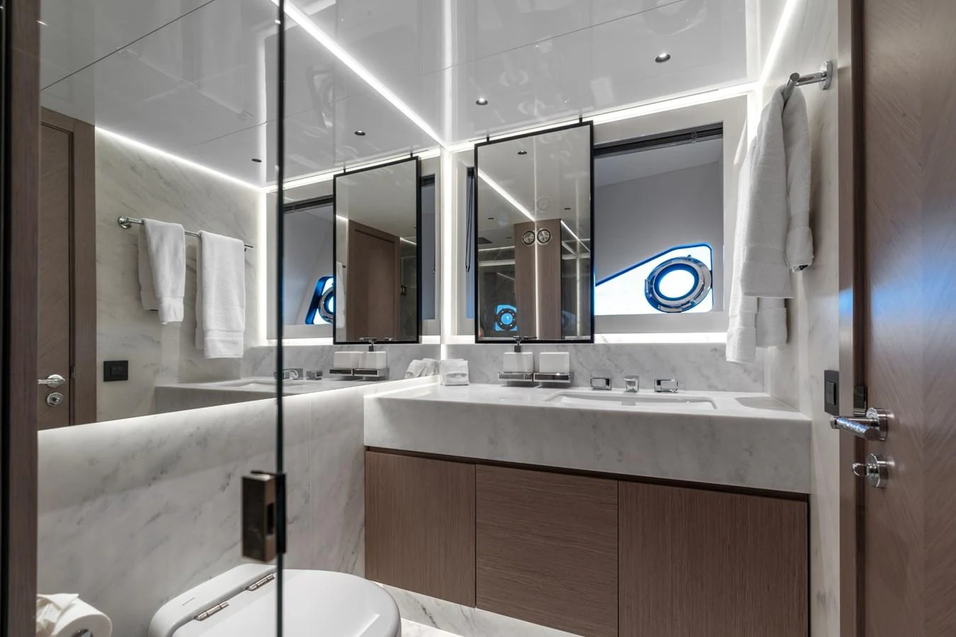 a bathroom with a large mirror aboard AURELIUS Yacht for Sale