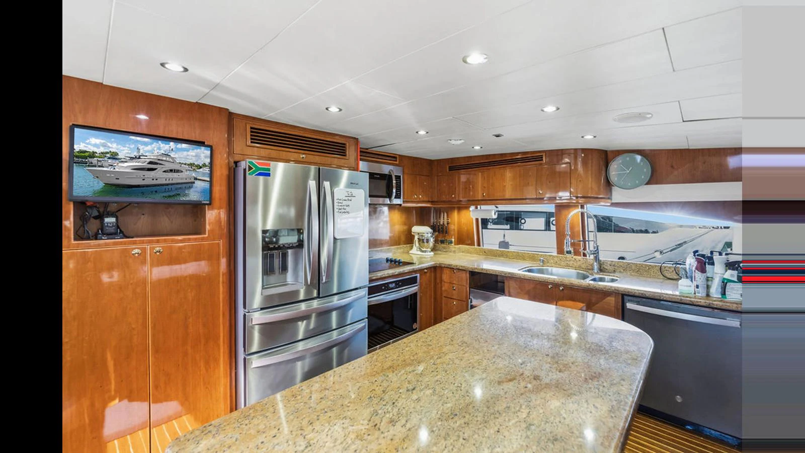 The galley features modern appliances and a spacious countertop, perfect for gourmet meal preparation. aboard PERFECT HARMONY Yacht for Sale