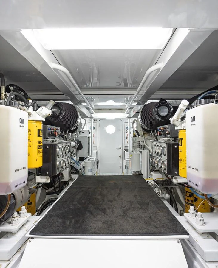 The image showcases the well-maintained engine room of the yacht, featuring advanced machinery and equipment. aboard HT HOOK Yacht for Sale