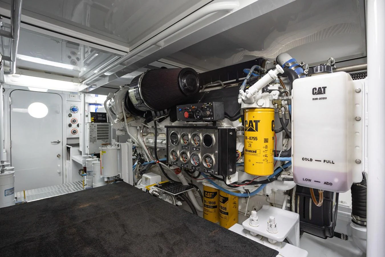 The image showcases the well-maintained engine room of the yacht, featuring advanced machinery and equipment. aboard HT HOOK Yacht for Sale