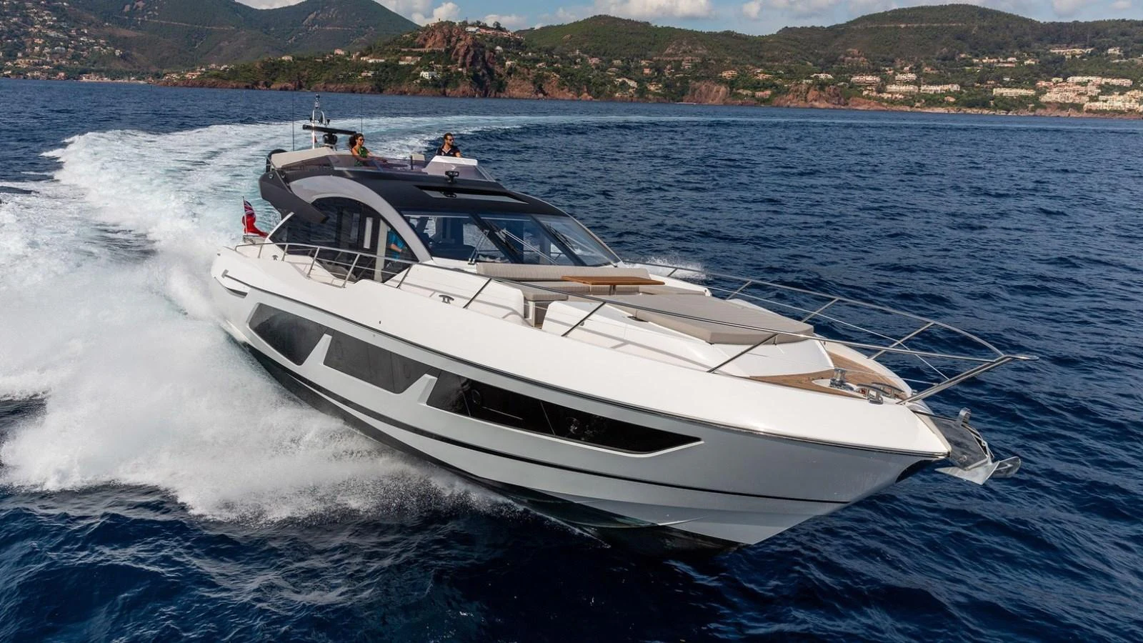 a white yacht on the water aboard GIOIA Yacht for Sale