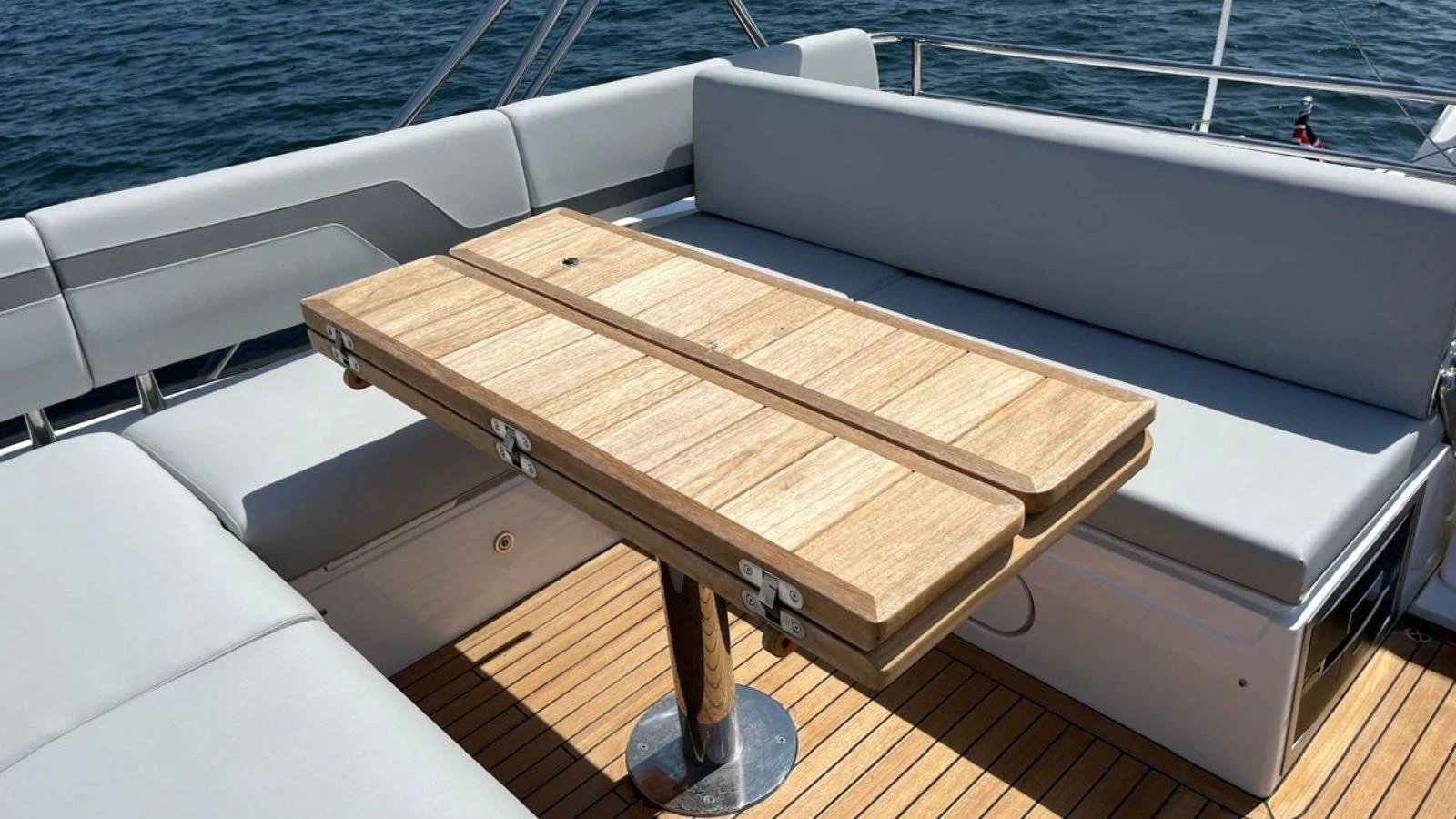 a wooden bench on a boat aboard GIOIA Yacht for Sale