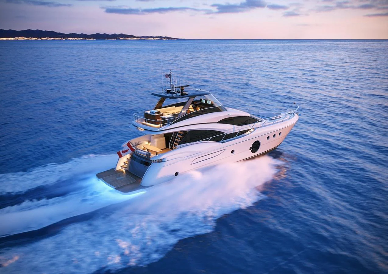 A sleek and modern yacht cruises swiftly on the open water at sunset. aboard NEPTUNUS 750S Yacht for Sale