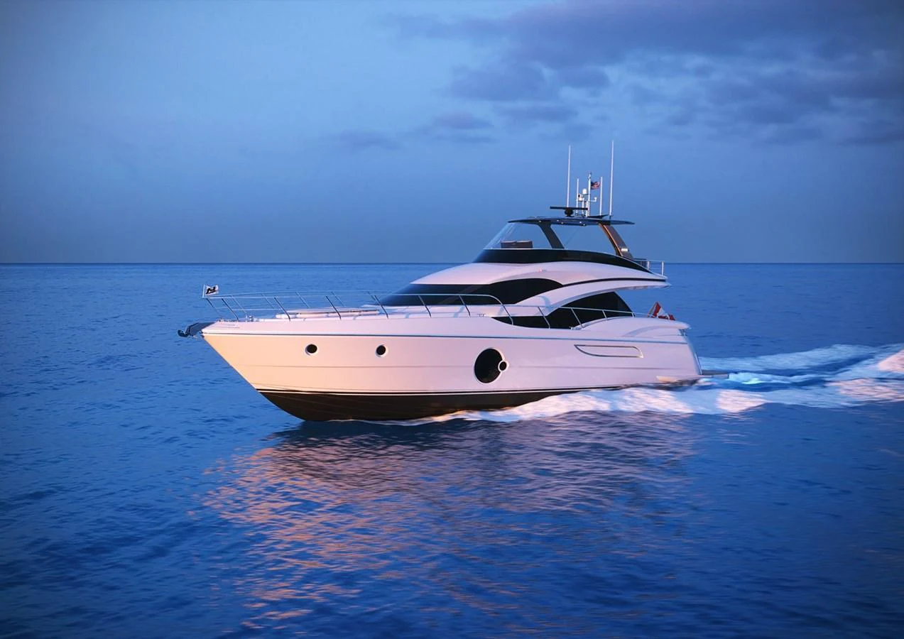 A sleek and modern yacht cruises gracefully on calm waters at dusk. aboard NEPTUNUS 750S Yacht for Sale