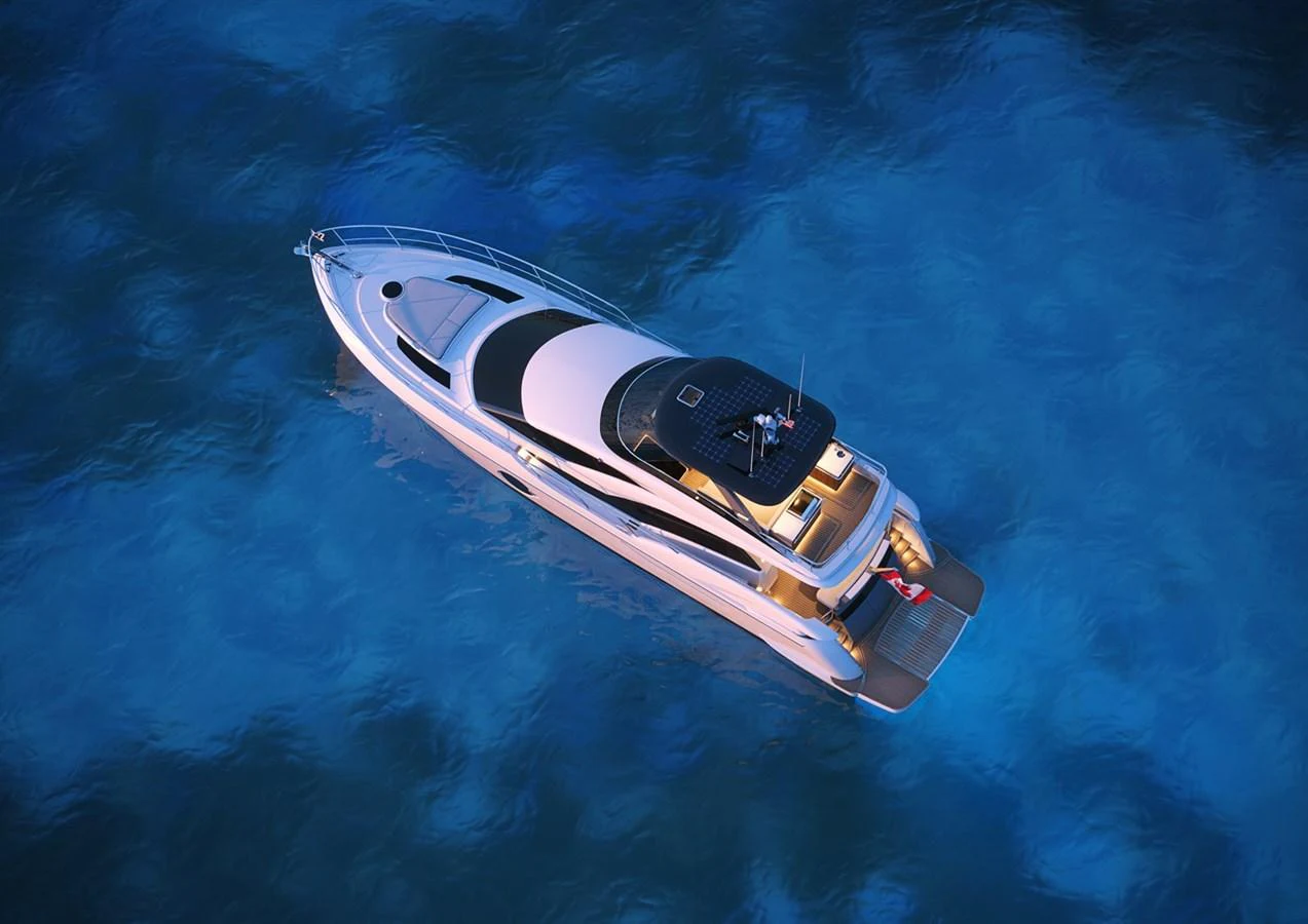 A sleek yacht glides gracefully on calm, blue waters, illuminated by soft lighting. aboard NEPTUNUS 750S Yacht for Sale