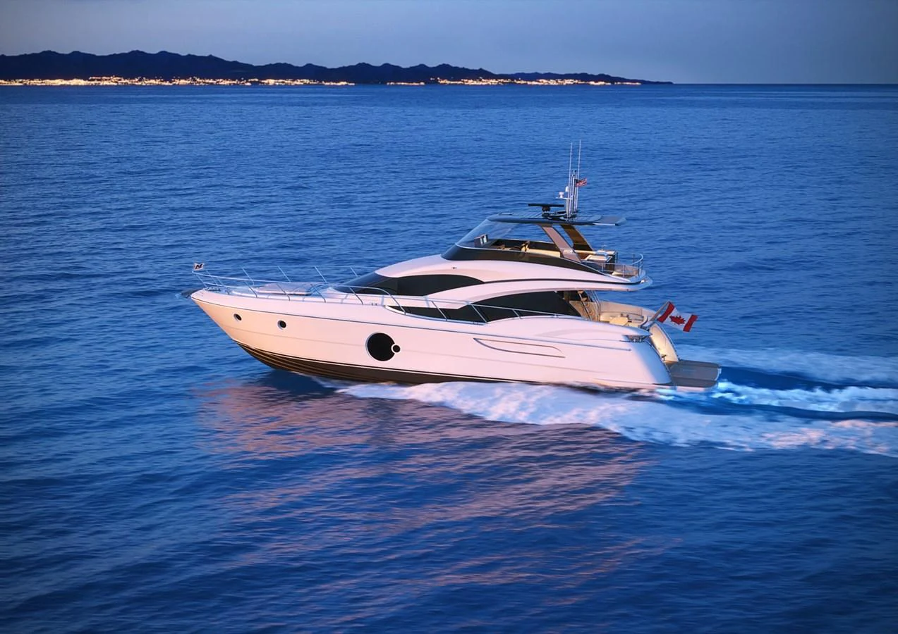 A sleek and modern yacht cruises smoothly on calm waters during twilight. aboard NEPTUNUS 750S Yacht for Sale