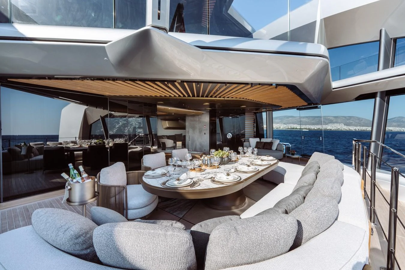 a large living room with a large balcony aboard THIS IS IT I Yacht for Sale