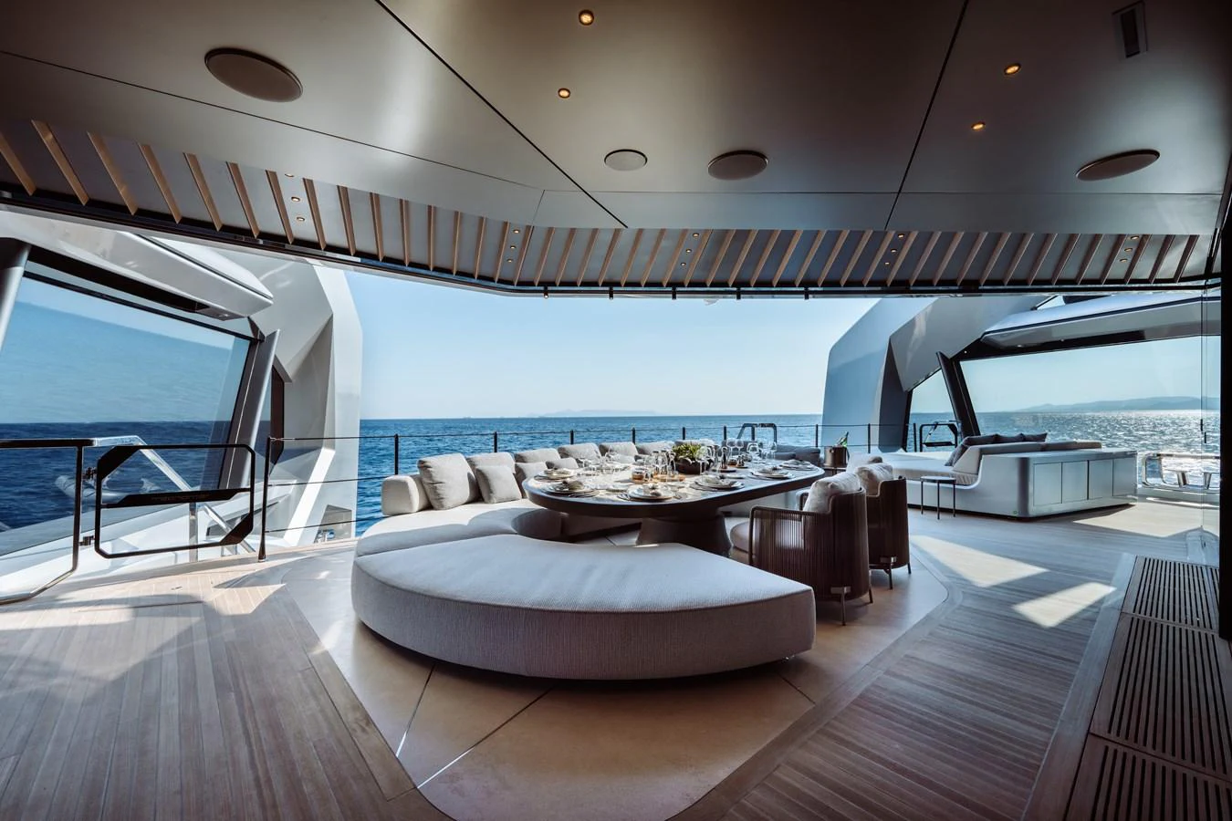 a large room with a large table and a large window aboard THIS IS IT I Yacht for Sale