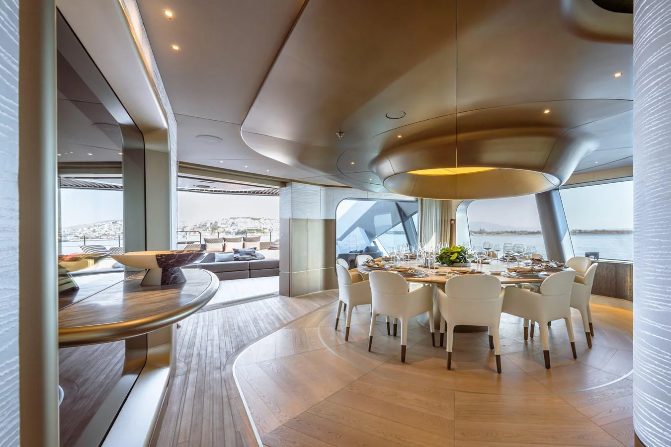 a room with tables and chairs aboard THIS IS IT I Yacht for Sale