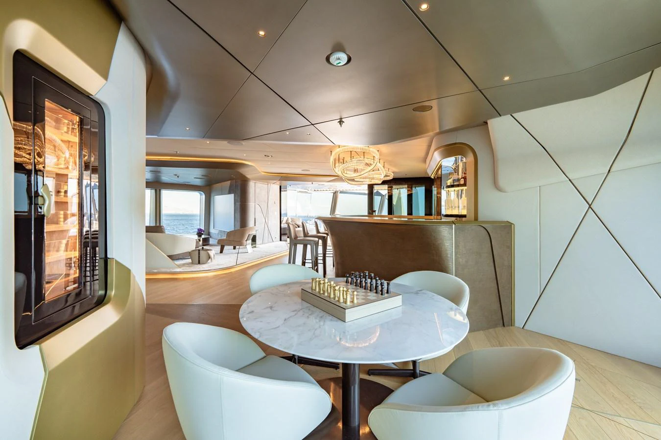 a room with a table and chairs aboard THIS IS IT I Yacht for Sale