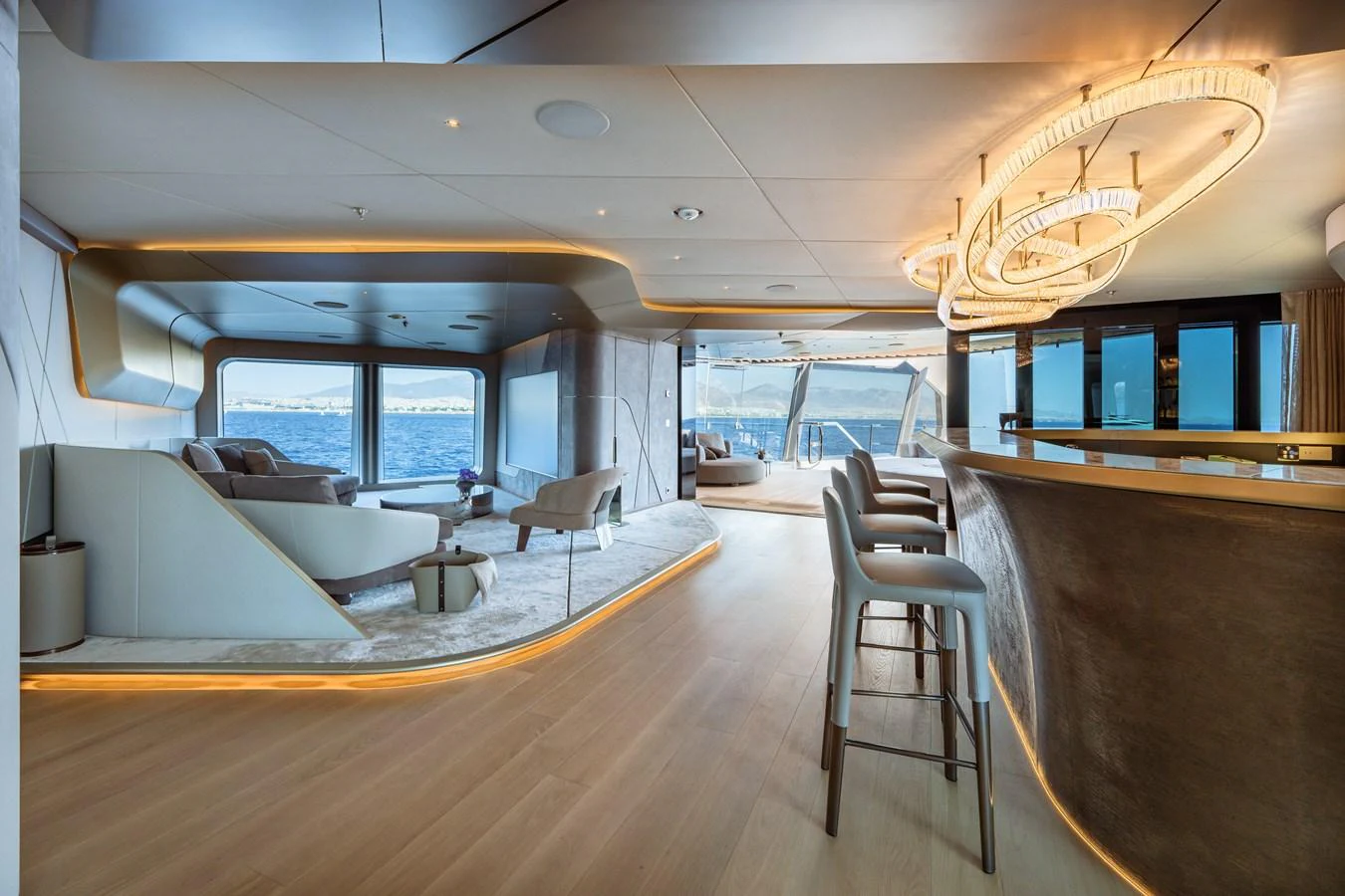 a room with a large chandelier aboard THIS IS IT I Yacht for Sale