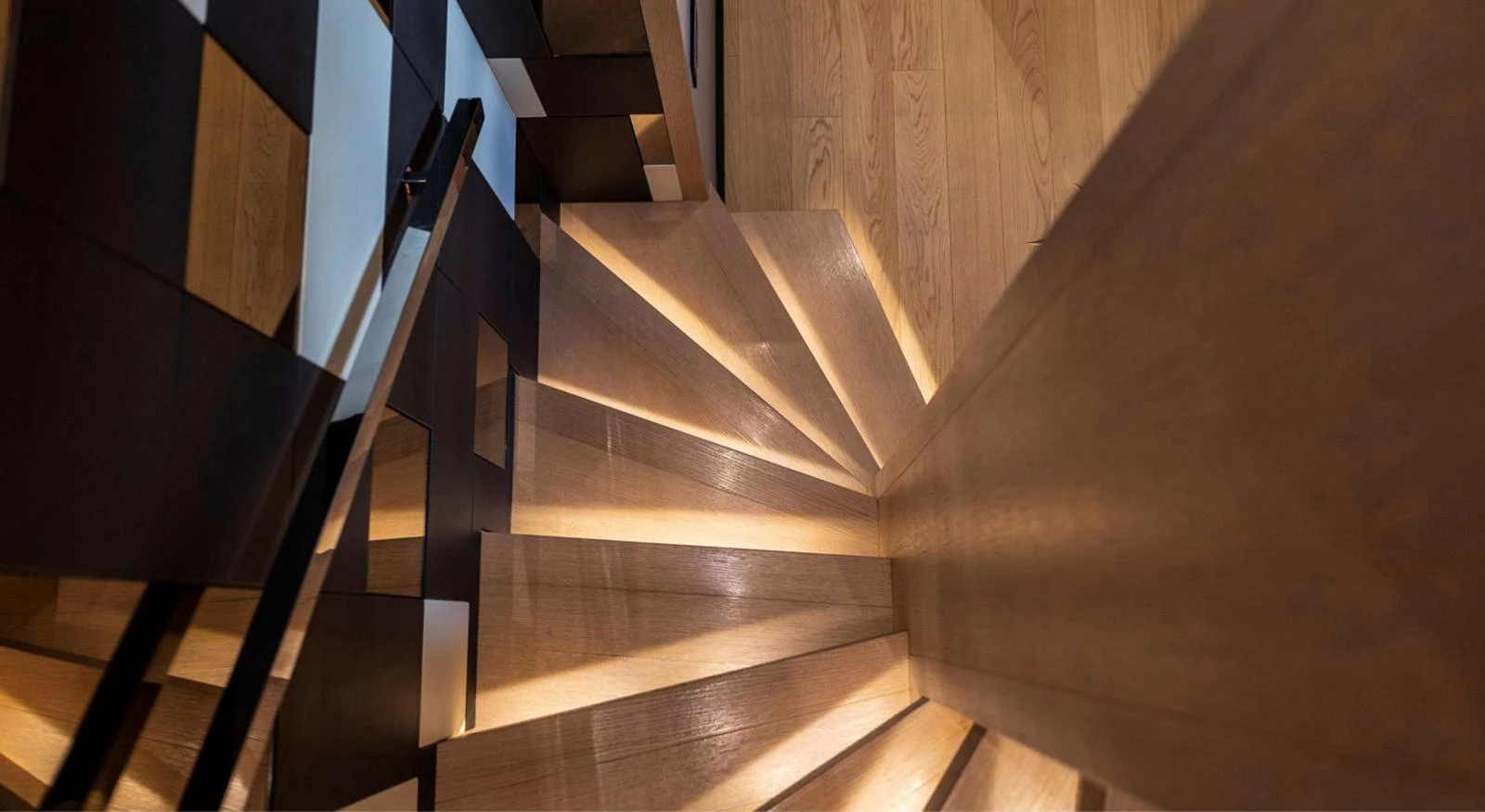 a staircase with a wood railing aboard AMAN - SL96 Yacht for Sale
