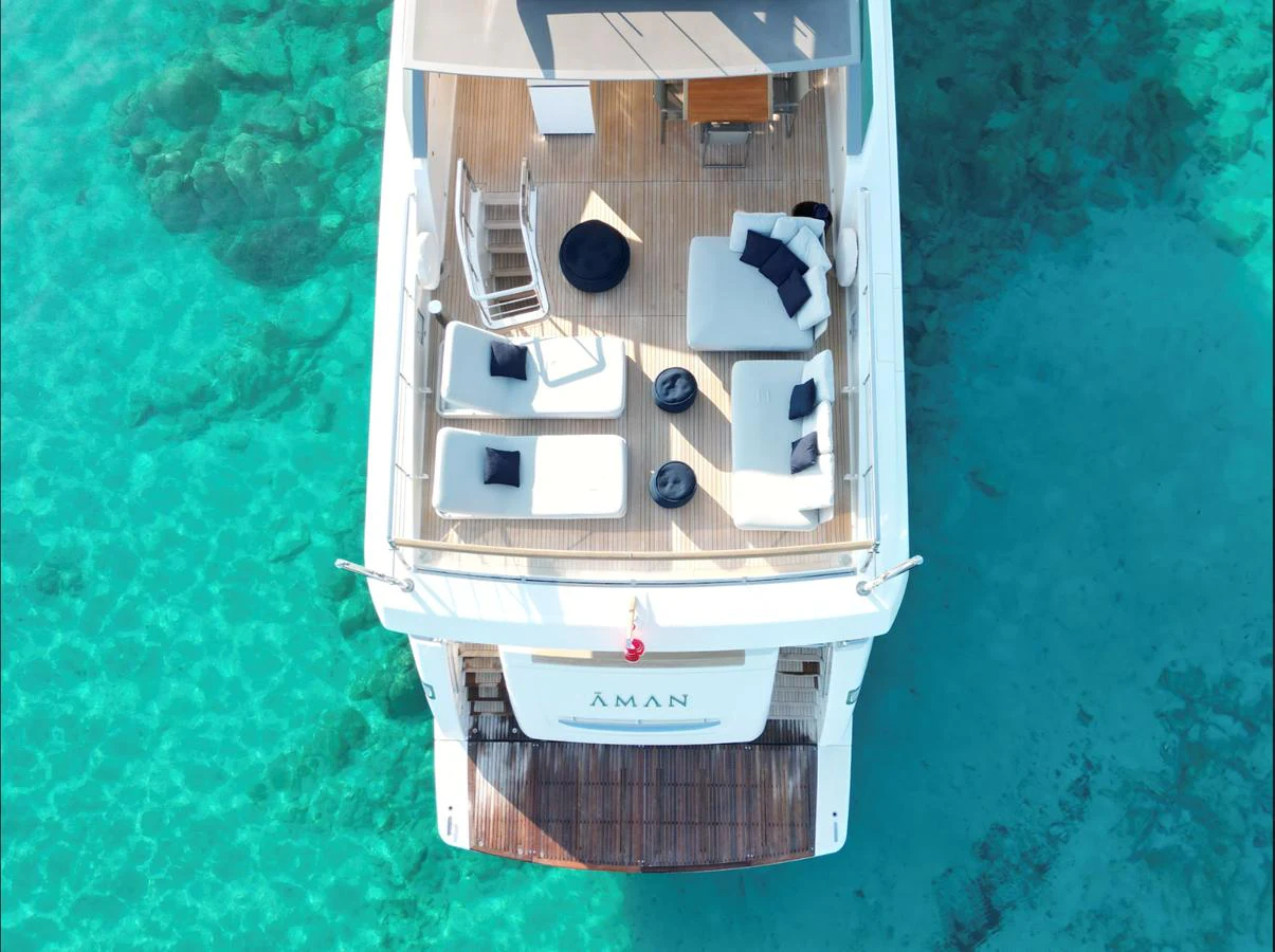 a small house on a patch of grass aboard AMAN - SL96 Yacht for Sale