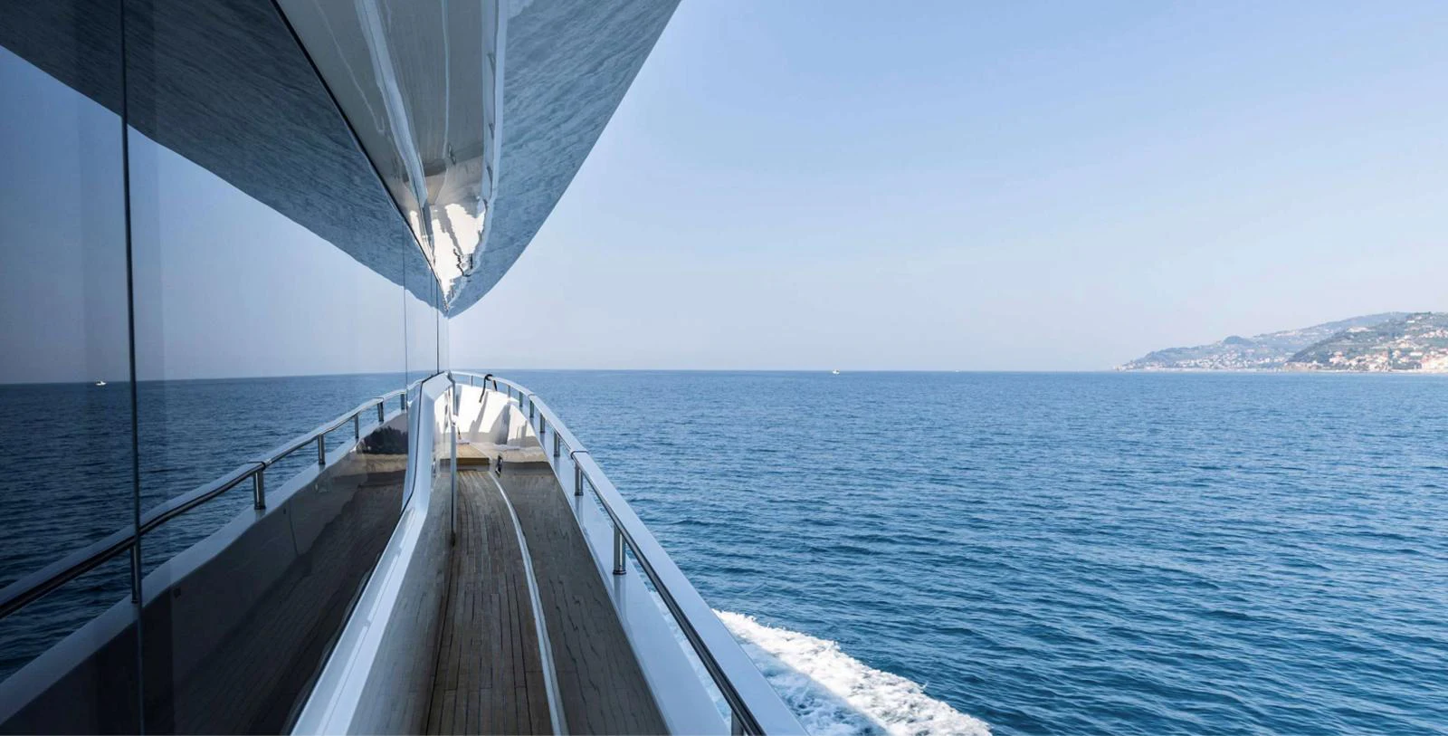 a long white bridge over water aboard AMAN - SL96 Yacht for Sale