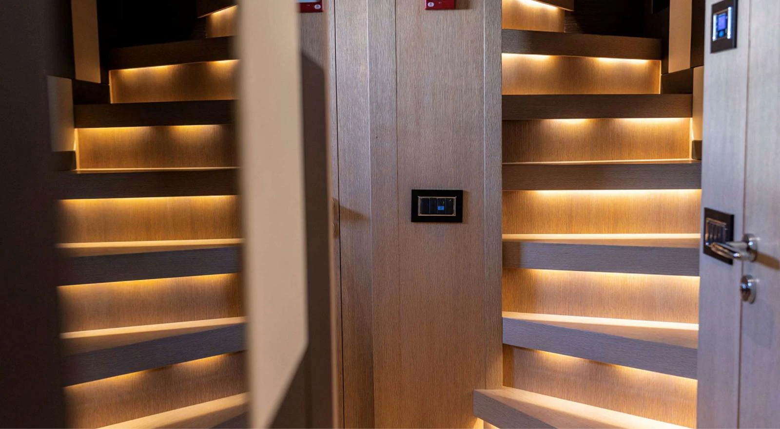a closet with a door and a vent aboard AMAN - SL96 Yacht for Sale