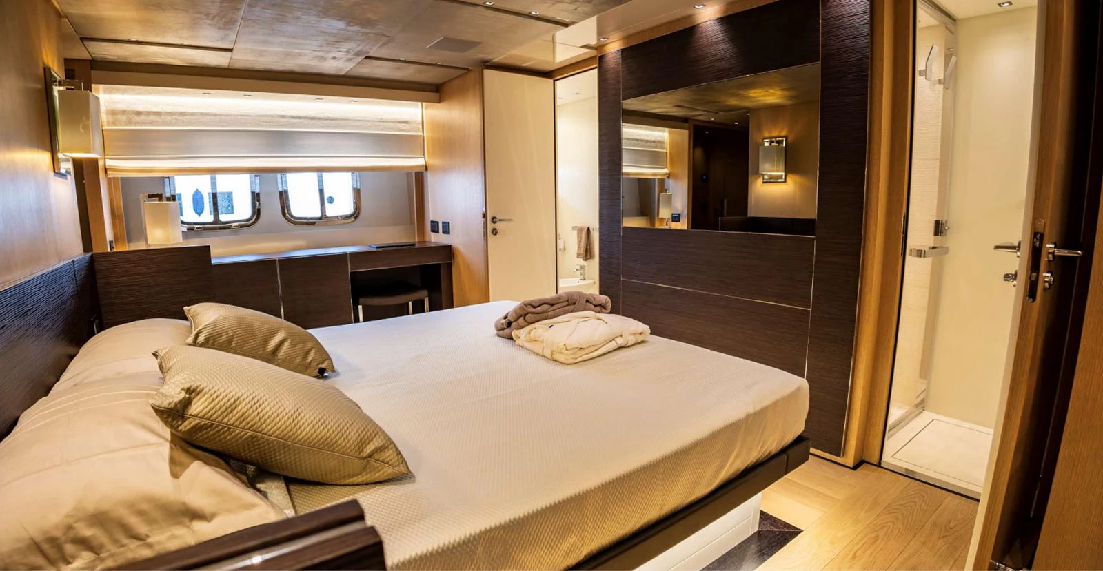 a bed in a room aboard AMAN - SL96 Yacht for Sale