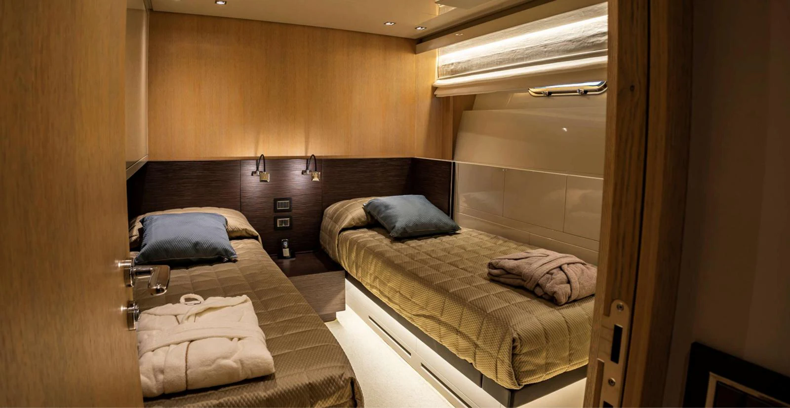a room with two beds aboard AMAN - SL96 Yacht for Sale