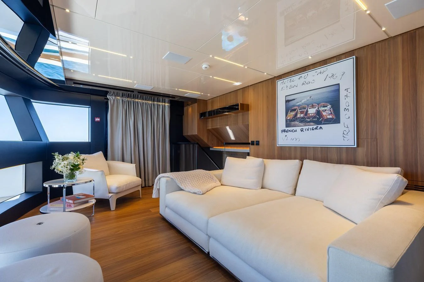 The salon features a spacious and modern design with comfortable seating and elegant decor. aboard NEVERLAND II Yacht for Sale