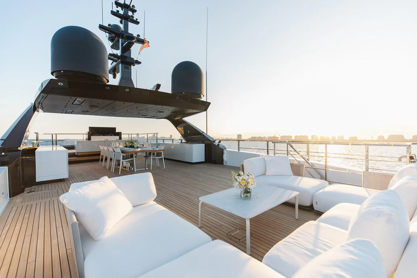 The sundeck offers a spacious and luxurious area for relaxation and dining with panoramic views. aboard NEVERLAND II Yacht for Sale