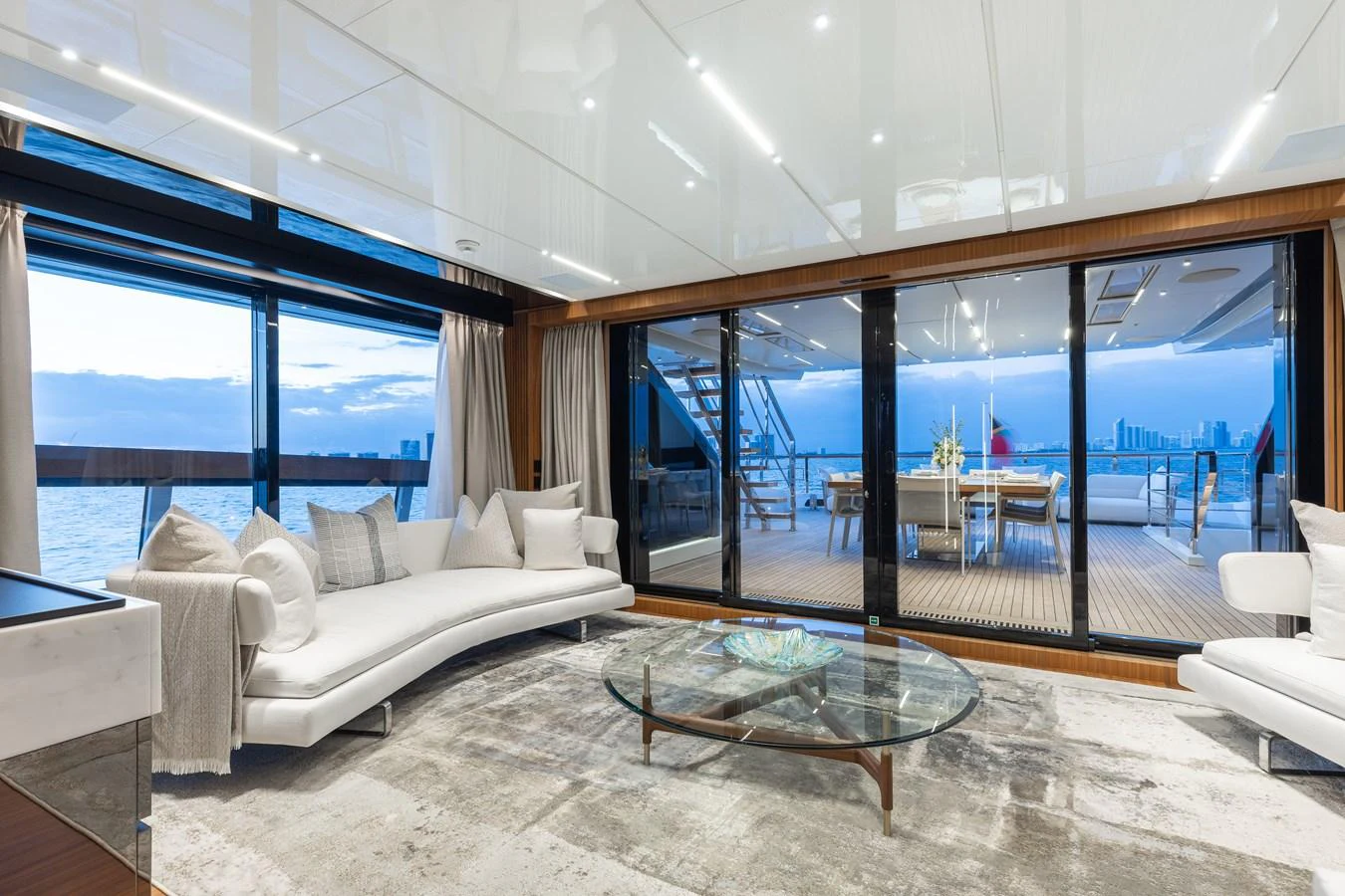 The salon offers a luxurious and spacious area with panoramic views and elegant furnishings. aboard NEVERLAND II Yacht for Sale
